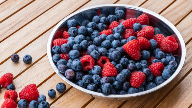 Berries raspberries wooden table spoon free wallpaper - medium preview image