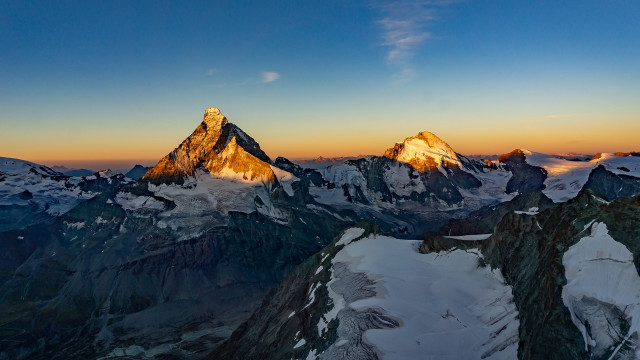 Snowy mountains sunset clouds beach free wallpaper - medium preview image