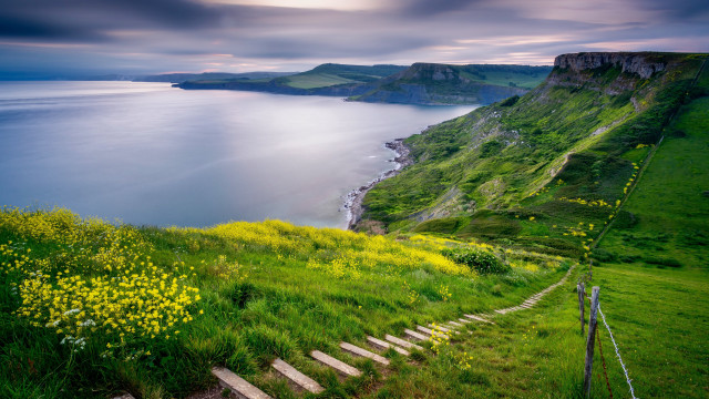Grassy hillside stairs lake cliff free wallpaper - medium preview image