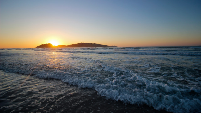 Sunset ocean waves island mountain #2 free wallpaper - medium preview image