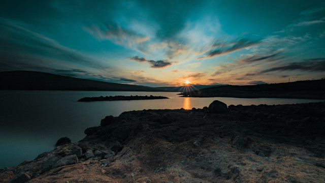 Sunset lake mountain reflection boat free wallpaper - medium preview image