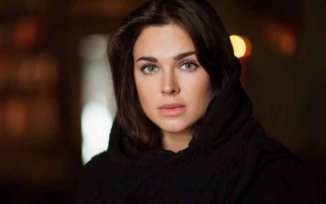 Woman blueeyes blackcoat serious portrait free wallpaper - medium preview image
