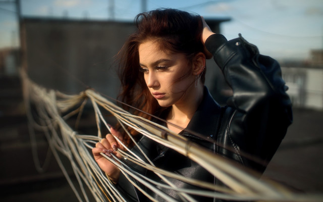 Woman leather jacket hammock sun free wallpaper - medium preview image