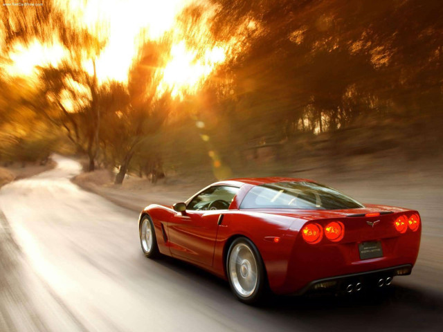 Red sports car driving road #30 free wallpaper - medium preview image