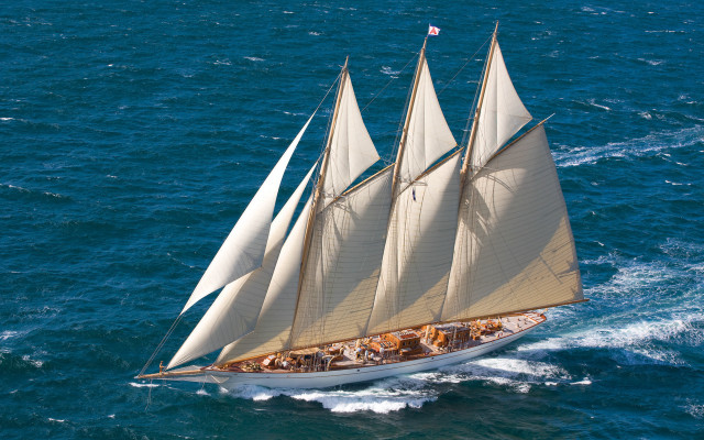 Sailboat ocean people beach dock free wallpaper - medium preview image