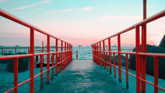Red metal walkway ocean sunset free wallpaper - medium preview image