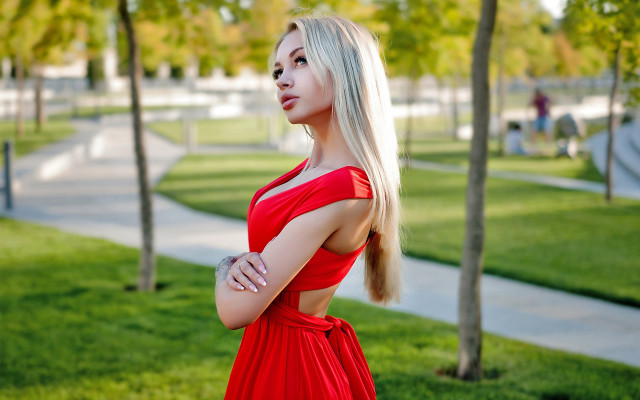 Red dress park blurry bokeh free wallpaper - medium preview image