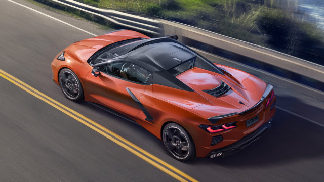Red sports car highway forest free wallpaper - medium preview image