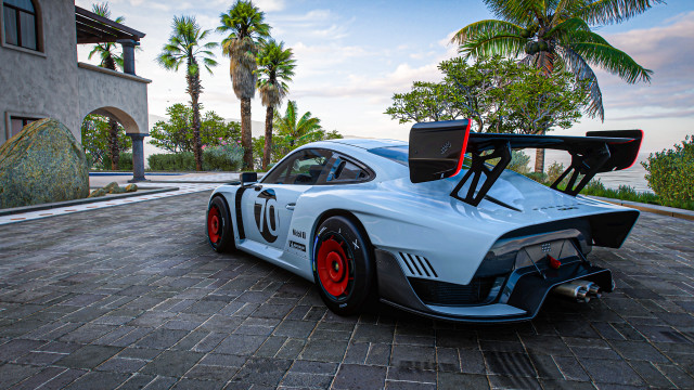White racecar brickroad palmtree clockbuilding free wallpaper - medium preview image