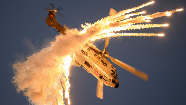 Helicopter smoke explosion battle embers free wallpaper - medium preview image