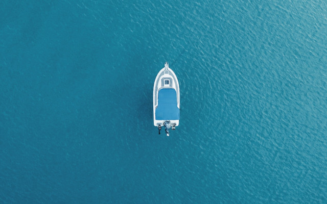 Small boat ocean shoreline minimalism free wallpaper - medium preview image