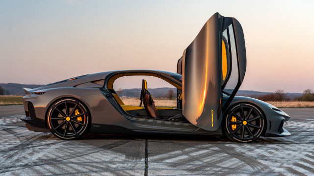 Futuristic car runway mountains sunset free wallpaper - medium preview image