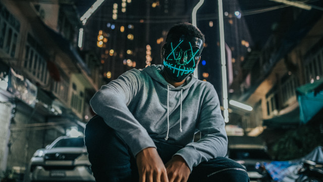 Neon mask man street corner free wallpaper - medium preview image