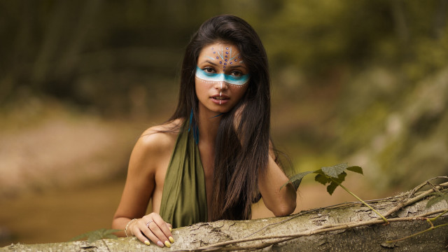 Blue eyed woman green shirt free wallpaper - medium preview image