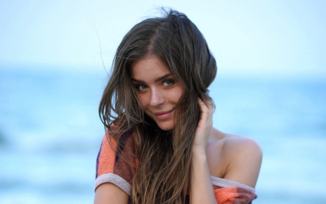 Woman beach longhair looking at free wallpaper - medium preview image