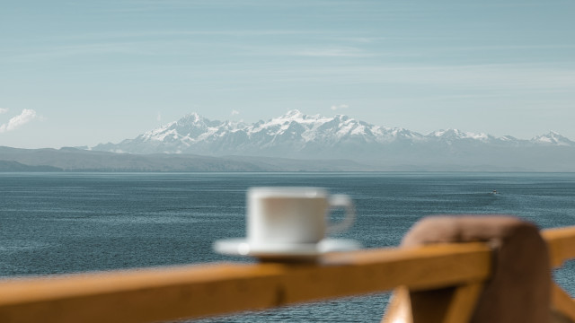 Coffee railing mountains water boat free wallpaper - medium preview image