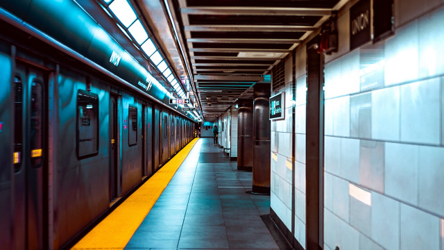 Long hallway yellow line train free wallpaper - medium preview image