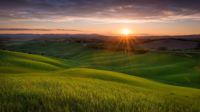 Sunset hills landscape clouds ocean free wallpaper - medium preview image