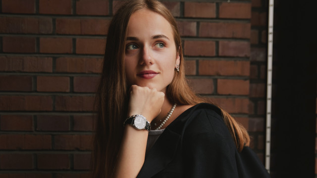 Elina Karimova BlackDress LongHair BrickWall free wallpaper - medium preview image