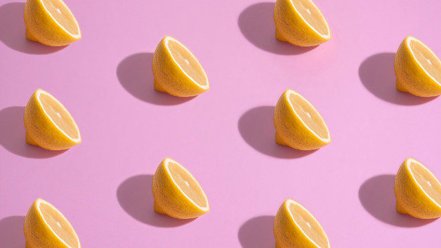 Orange slices pink surface shadow free wallpaper - medium preview image