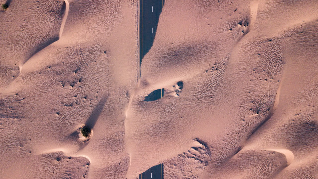 Snowy road footprints car land free wallpaper - medium preview image