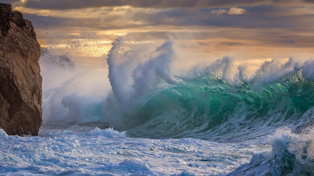 Large wave cliff sunset person free wallpaper - medium preview image