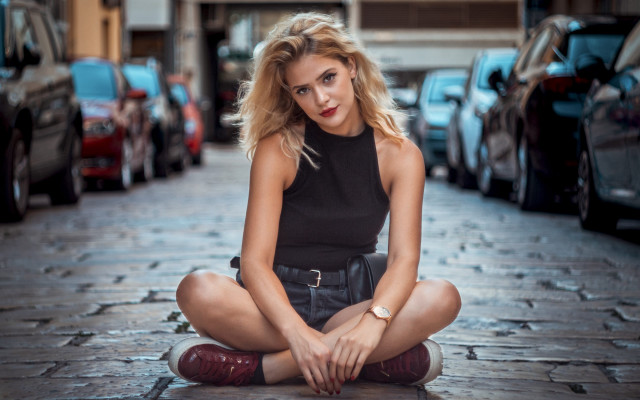 Woman sitting black top skirt free wallpaper - medium preview image