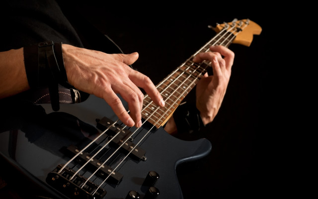 Man playing bass guitar black free wallpaper - medium preview image