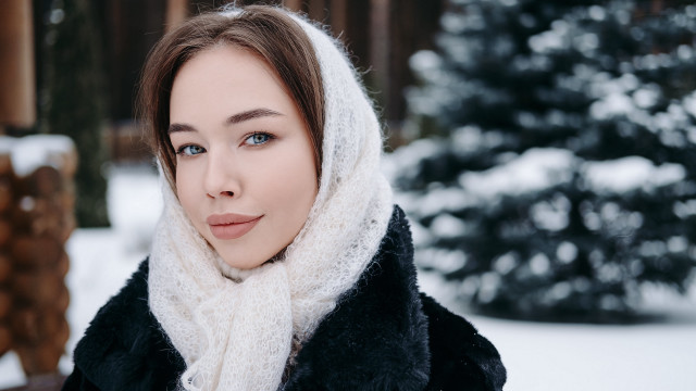Snowy woman scarf bokeh coat free wallpaper - medium preview image