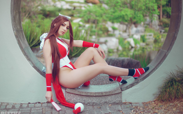 Woman red white sitting outdoors free wallpaper - medium preview image