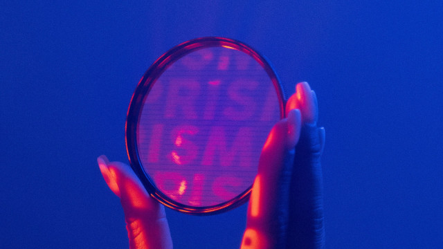 Person holding magnifyingglass no more free wallpaper - medium preview image
