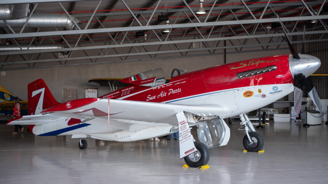 Red white plane hanger man free wallpaper - medium preview image