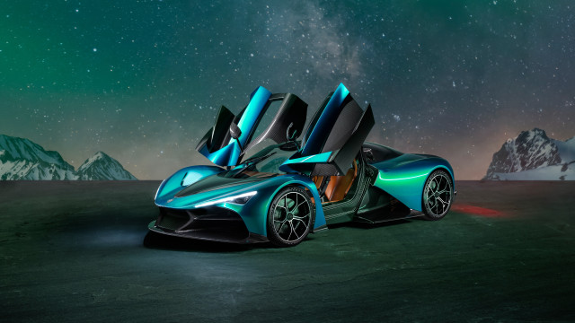 Futuristic car desert mountains starry free wallpaper - medium preview image