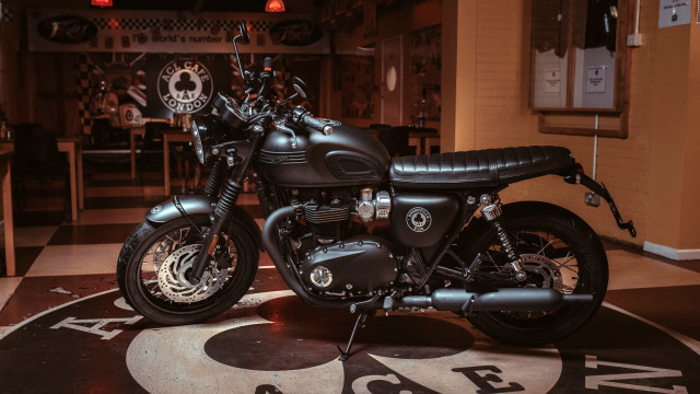 Motorcycle parked room clock table free wallpaper - medium preview image