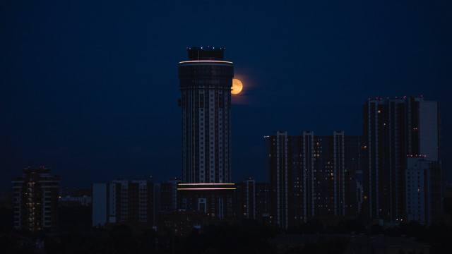 Full moon cityscape brutalism architecture free wallpaper - medium preview image