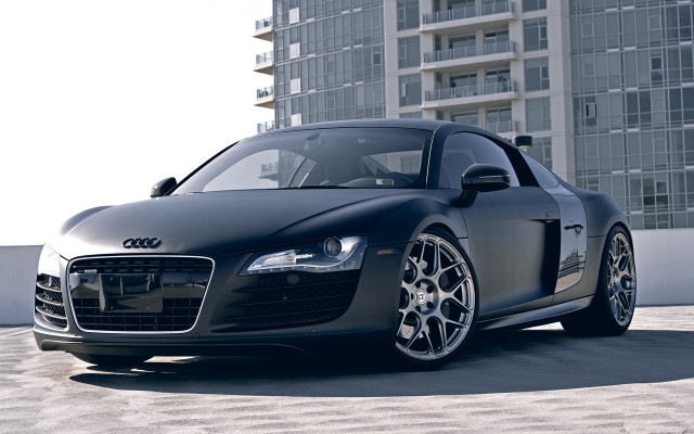 Black car tall building sky free wallpaper - medium preview image