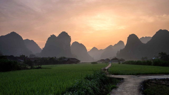 Field path village mountains sunset free wallpaper - medium preview image