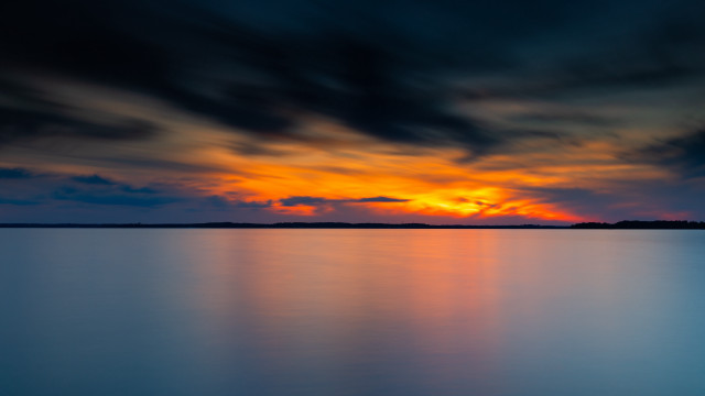 Sunset mountain lake boat mystical free wallpaper - medium preview image