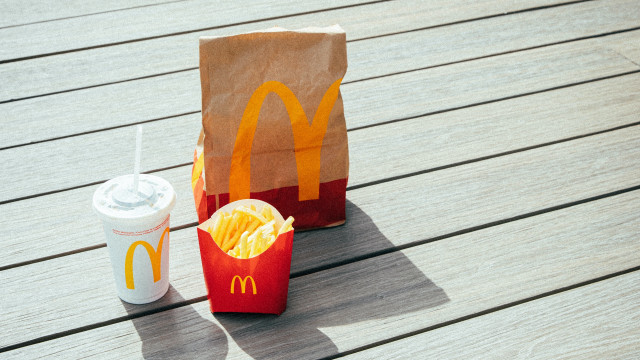 Mcdonalds bag drink wooden table free wallpaper - medium preview image
