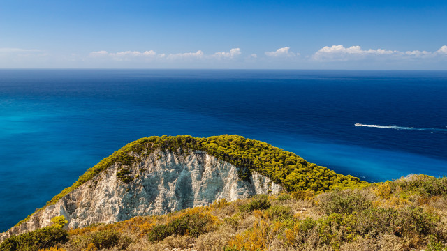 Boat cliff beach landscape sunset free wallpaper - medium preview image