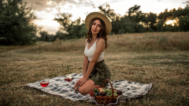 Woman sitting field basket fruit free wallpaper - medium preview image