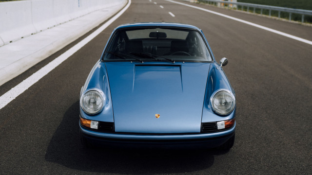 Blue car bridge building puzzle free wallpaper - medium preview image