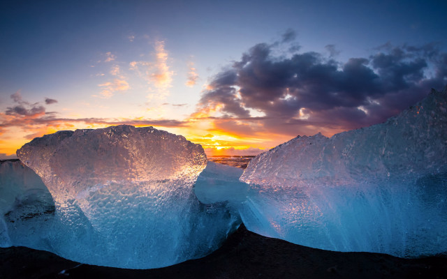Iceberg beach sunset cityscape clouds free wallpaper - medium preview image