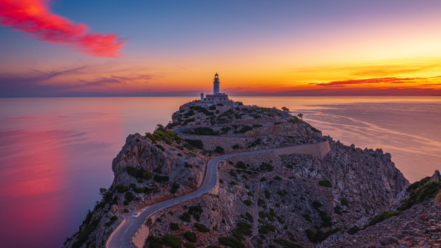 Lighthouse cliff ocean sunset red free wallpaper - medium preview image