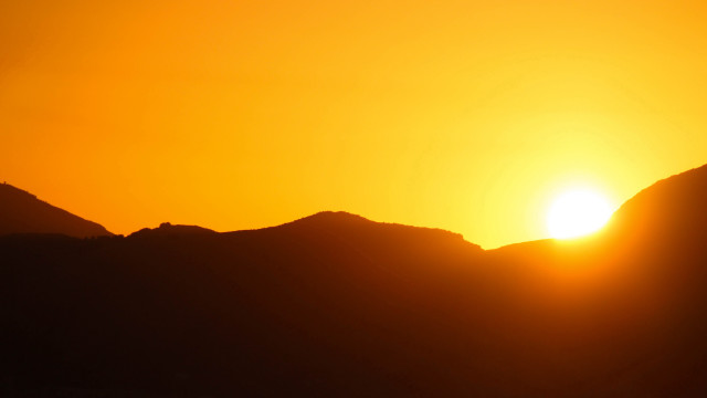 Bird sunset mountains orange sky free wallpaper - medium preview image