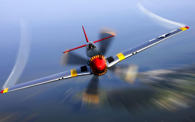 Small airplane over water sky free wallpaper - medium preview image