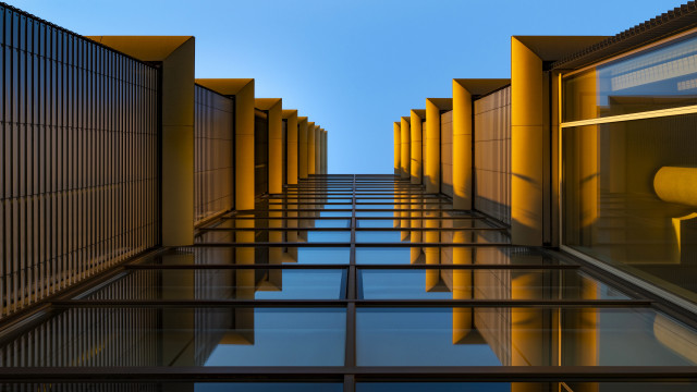 Yellow buildings blue sky yellow free wallpaper - medium preview image