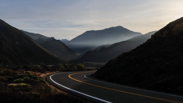 Mountain road sunset clouds forest free wallpaper - medium preview image