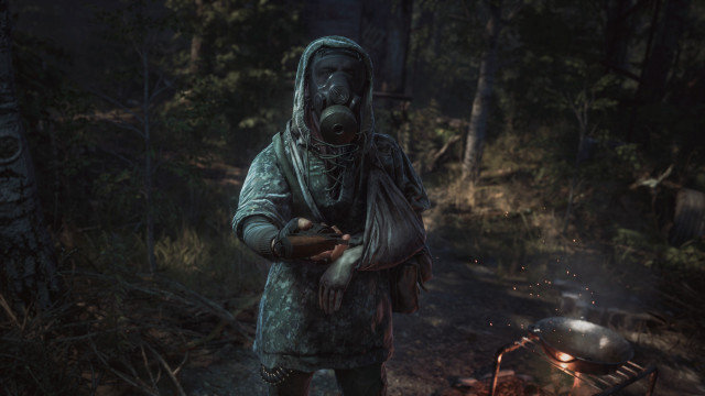 Gas mask man campfire forest free wallpaper - medium preview image