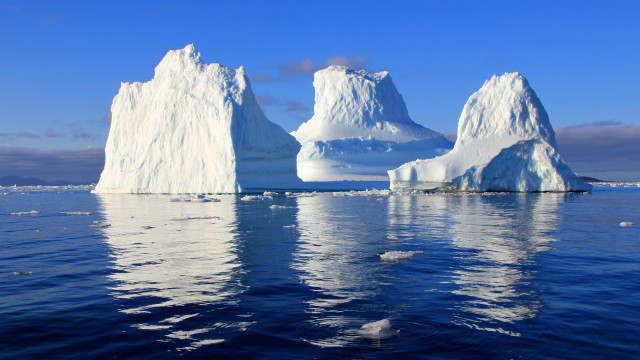 Iceberg ocean birds sky mountains free wallpaper - medium preview image